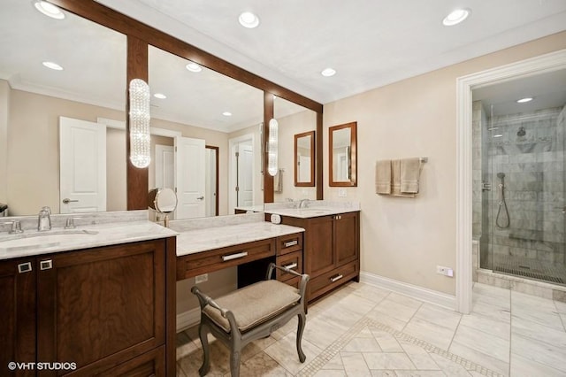 bathroom with tile patterned floors, vanity, an enclosed shower, and ornamental molding