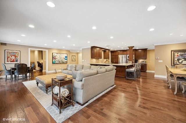 living room featuring dark hardwood / wood-style flooring