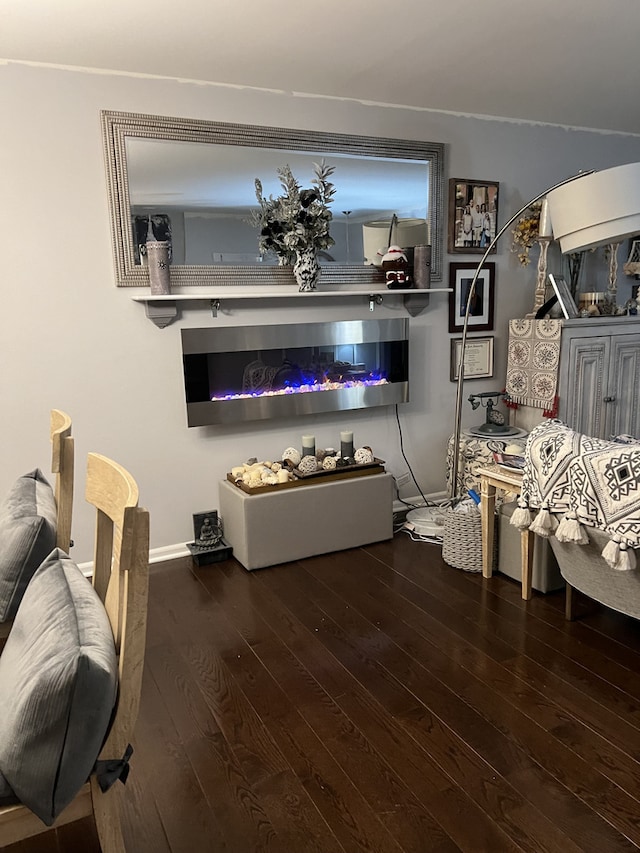 living room featuring dark wood-type flooring