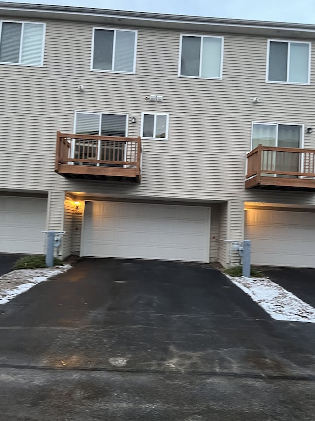 rear view of house with a balcony