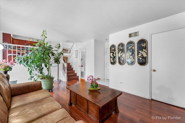 living room featuring dark hardwood / wood-style floors