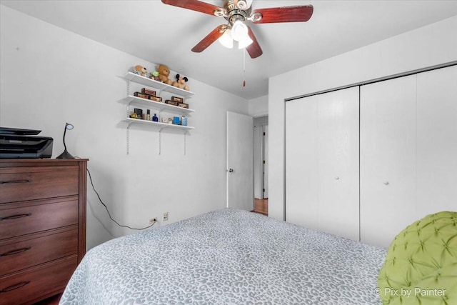 bedroom featuring a closet and ceiling fan