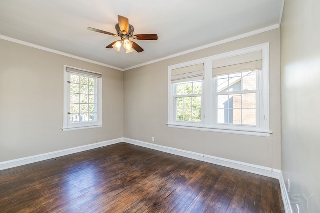 empty room featuring dark hardwood / wood-style floors, ceiling fan, and crown molding