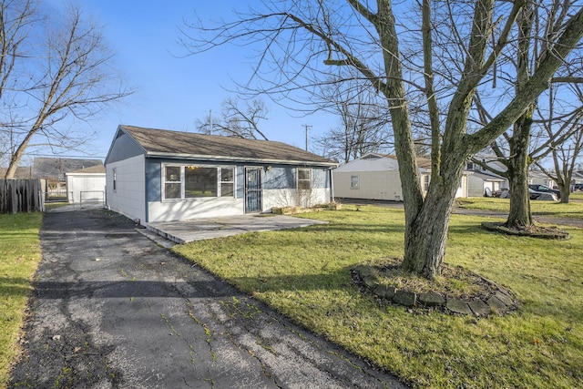 view of front of home with a front yard