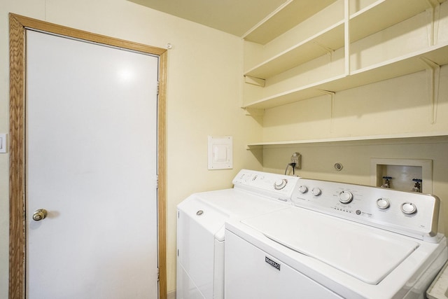 clothes washing area with independent washer and dryer