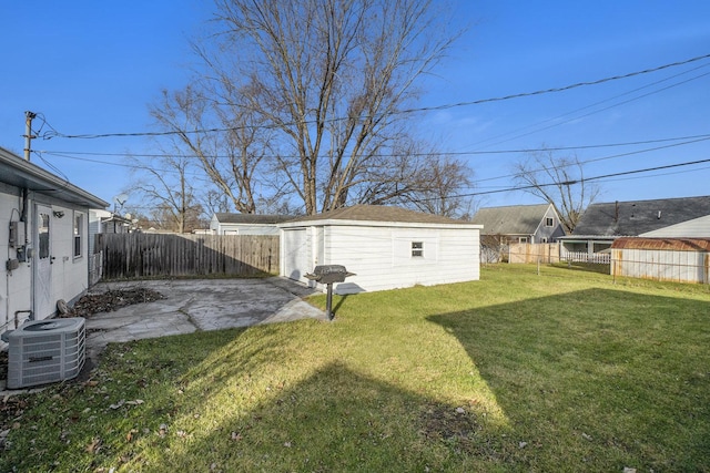 view of yard featuring a patio area and central AC