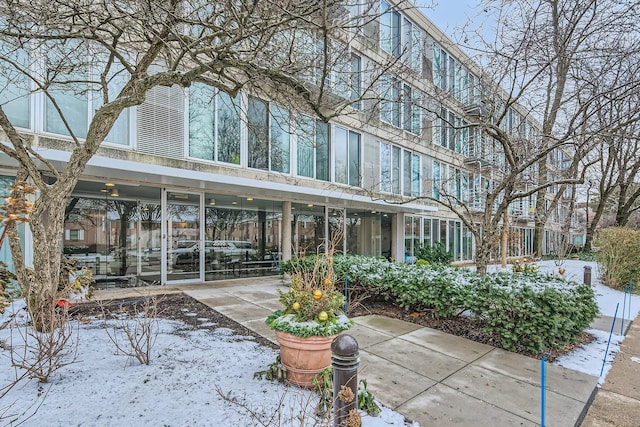 view of snow covered property