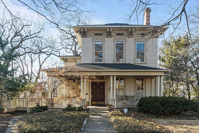 italianate-style house featuring covered porch