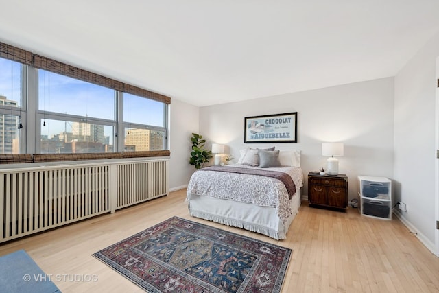 bedroom featuring light wood-type flooring