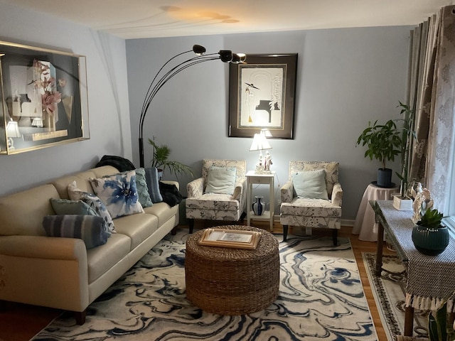 sitting room with hardwood / wood-style floors