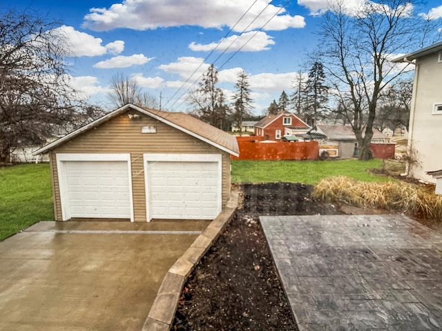 garage with a yard