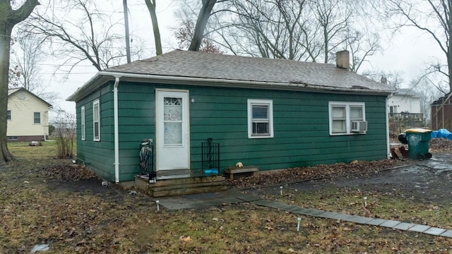 view of front facade featuring cooling unit