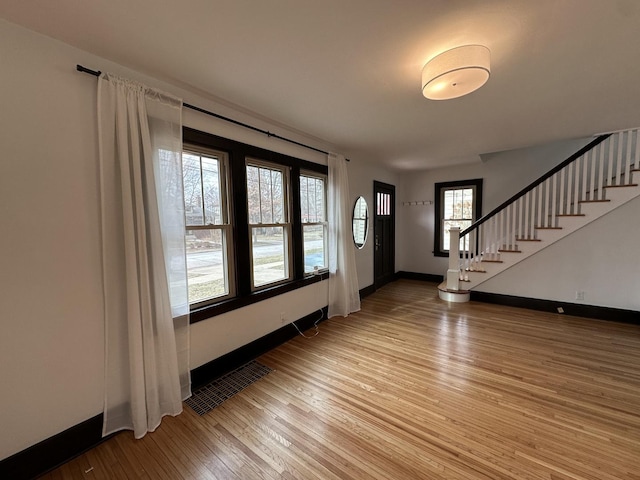 entrance foyer with wood-type flooring