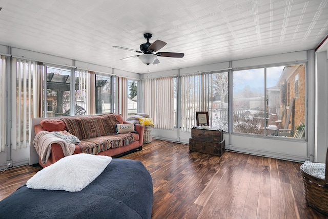 sunroom with ceiling fan and plenty of natural light