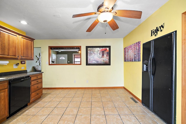 kitchen with black appliances, ceiling fan, and light tile patterned floors