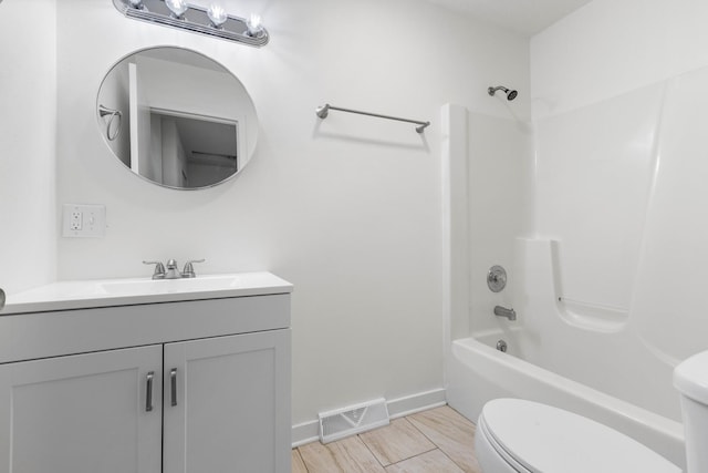 full bathroom with vanity, toilet, and shower / bath combination