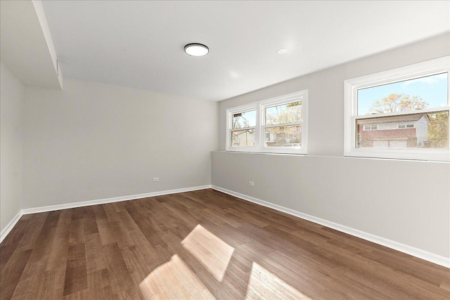 empty room featuring wood-type flooring