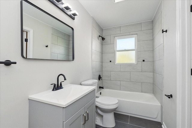 full bathroom with vanity, toilet, and tiled shower / bath