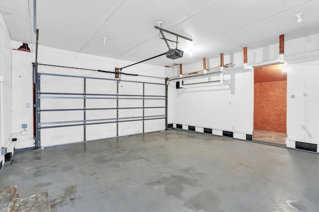 garage featuring a garage door opener