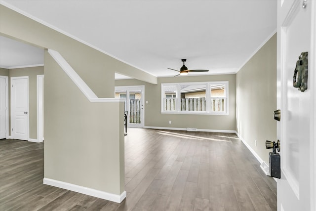 interior space featuring hardwood / wood-style flooring, ceiling fan, and ornamental molding