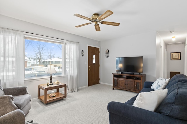 living room featuring ceiling fan and light colored carpet