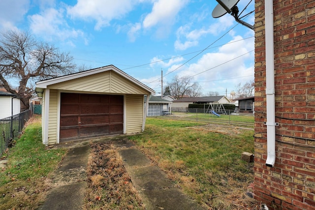 garage with a yard