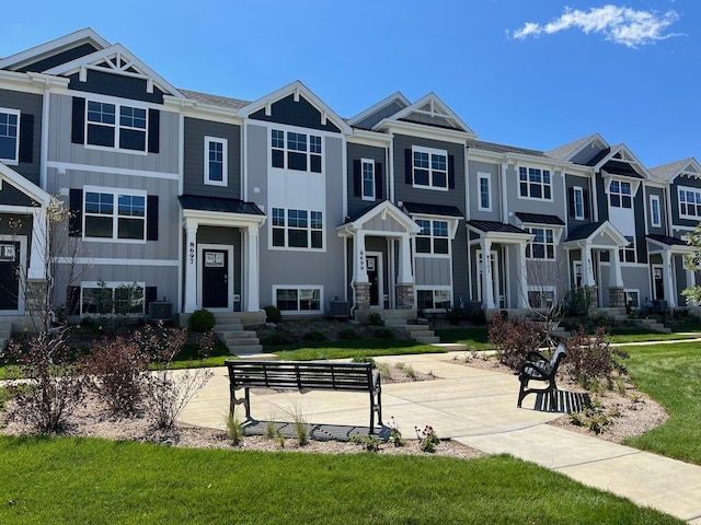 view of front of property featuring central air condition unit