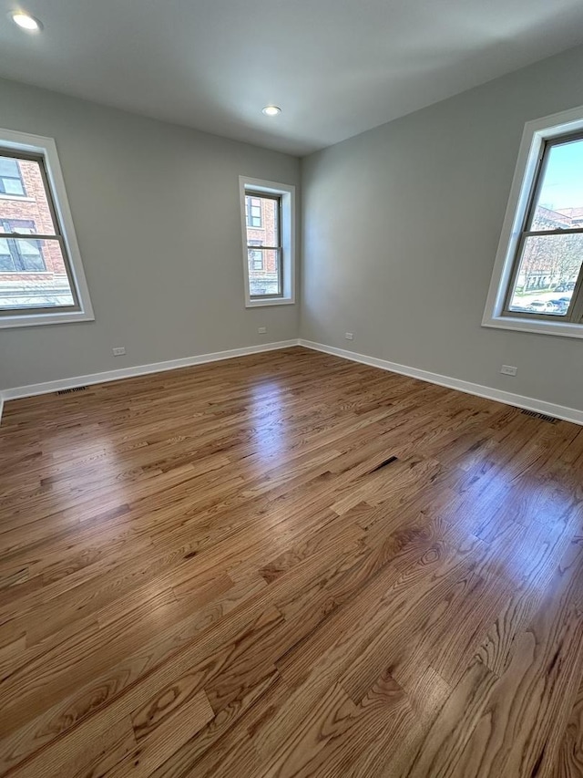 unfurnished room featuring light wood-type flooring