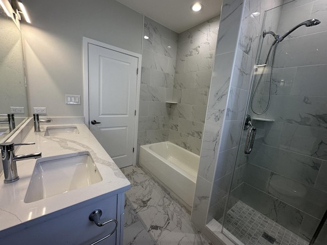 bathroom with vanity and separate shower and tub