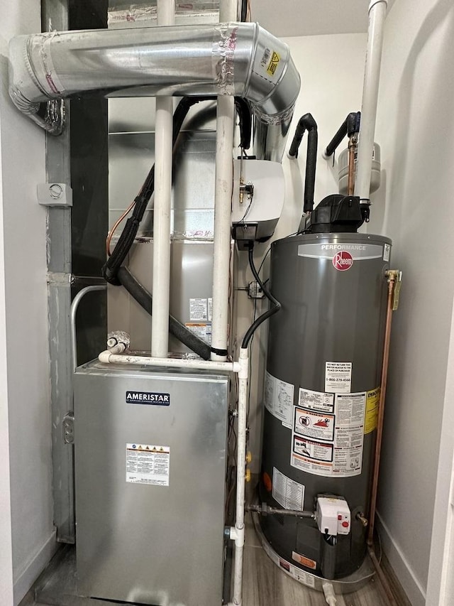 utility room with water heater