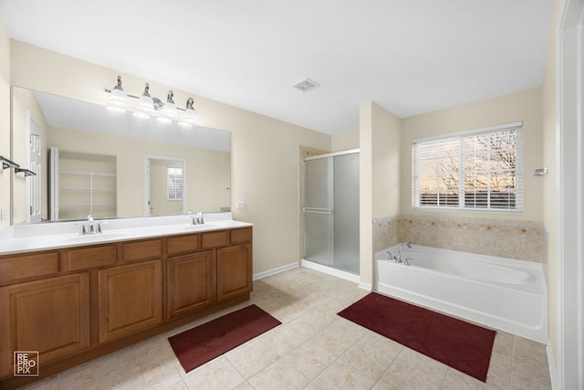 bathroom featuring double vanity, visible vents, a sink, a shower stall, and a bath