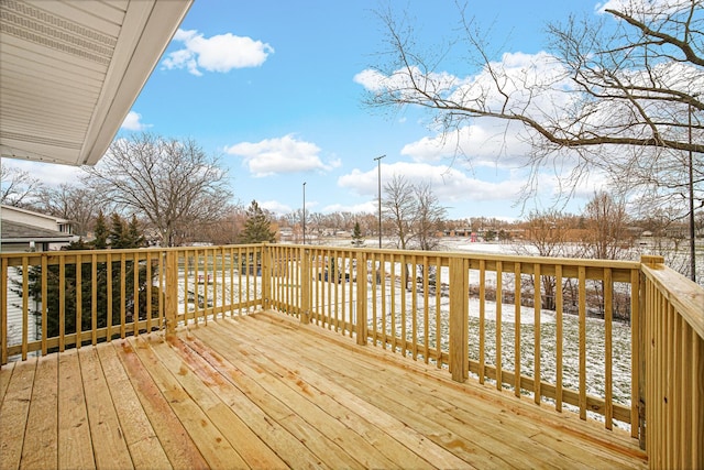 view of snow covered deck