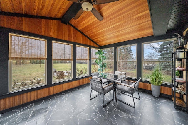 sunroom with vaulted ceiling with beams, ceiling fan, and wood ceiling