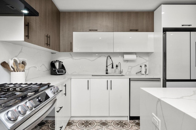 kitchen featuring ventilation hood, white appliances, white cabinetry, and sink