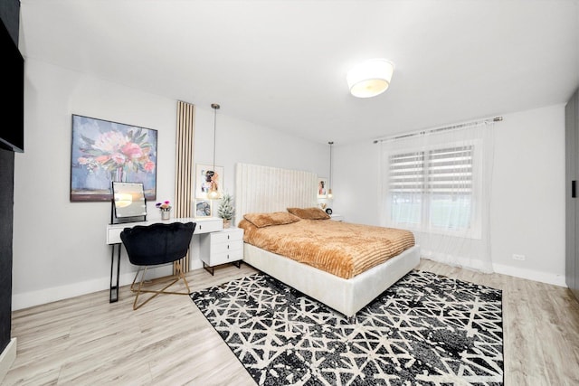 bedroom featuring hardwood / wood-style floors