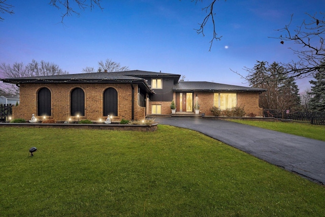 view of front of home featuring a yard