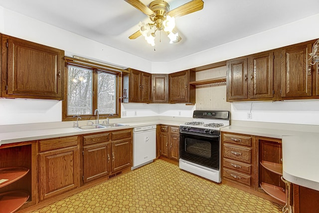 kitchen with sink, ceiling fan, dishwasher, and range with gas stovetop