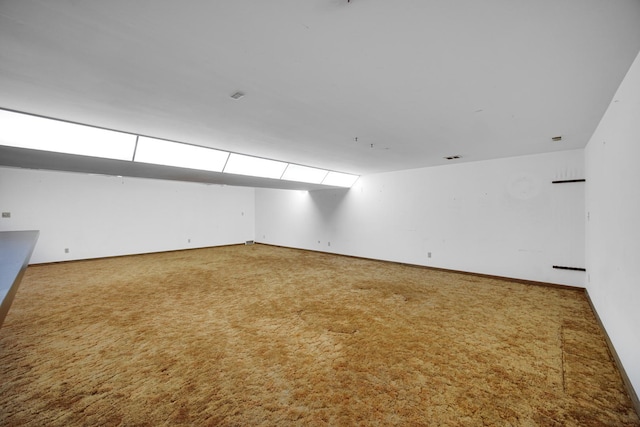 unfurnished room featuring carpet flooring