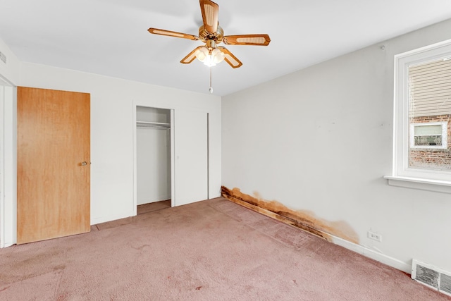 unfurnished bedroom featuring carpet flooring and ceiling fan