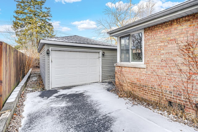 view of snow covered garage