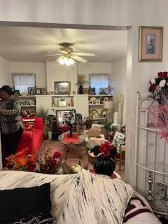 interior space featuring ceiling fan