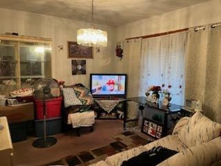 living room with a chandelier