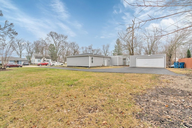 view of yard featuring a garage