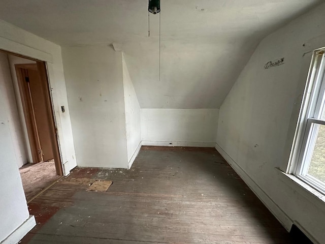 bonus room featuring vaulted ceiling