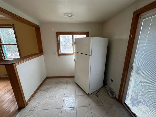 kitchen featuring white refrigerator