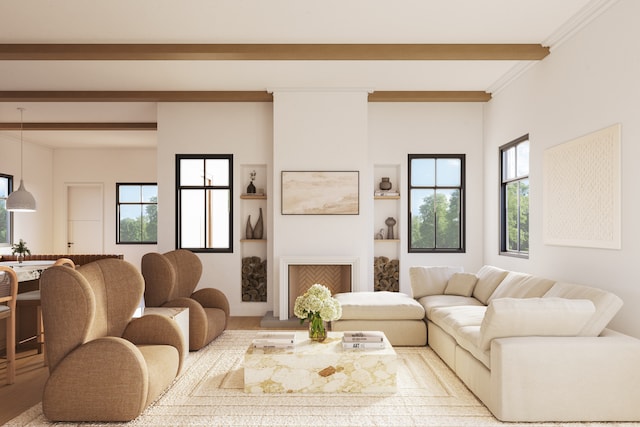 living room with crown molding and beamed ceiling