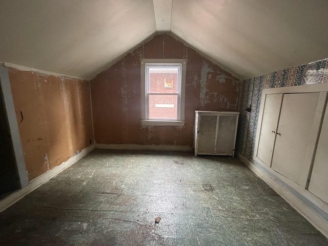 additional living space with lofted ceiling