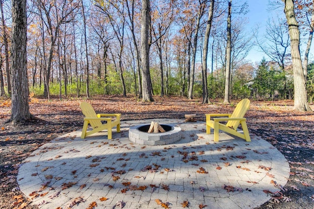 view of patio / terrace with a fire pit