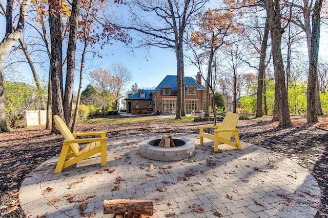 view of patio featuring an outdoor fire pit