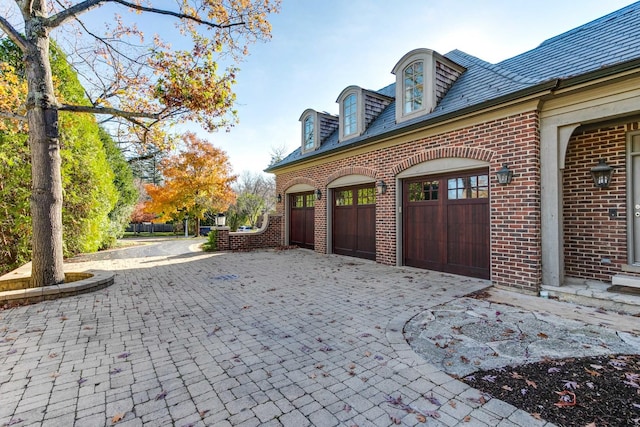 view of home's exterior featuring a garage